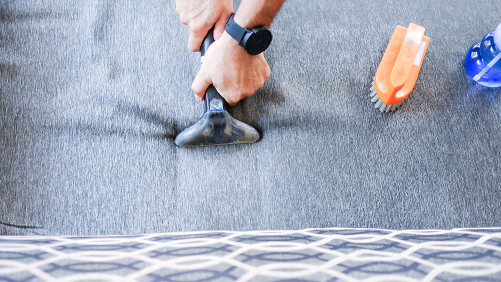 Using HEPA Vacuum to Remove Dust