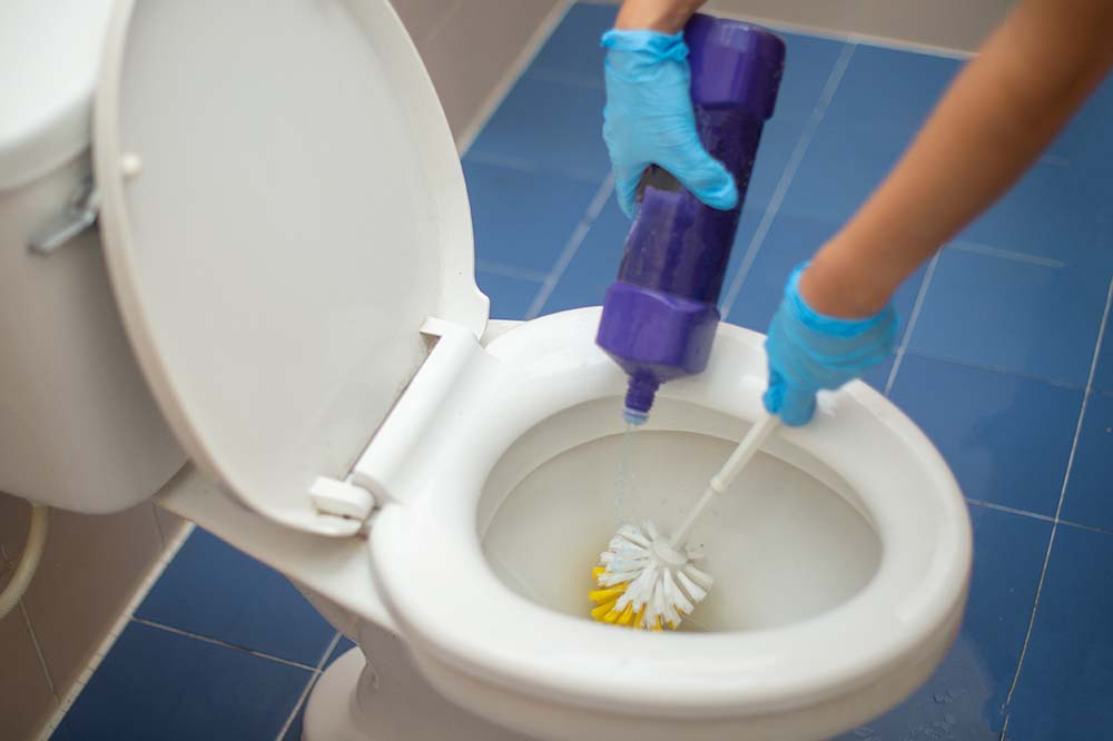Pouring Acids onto Toilet to Eliminate Bacteria